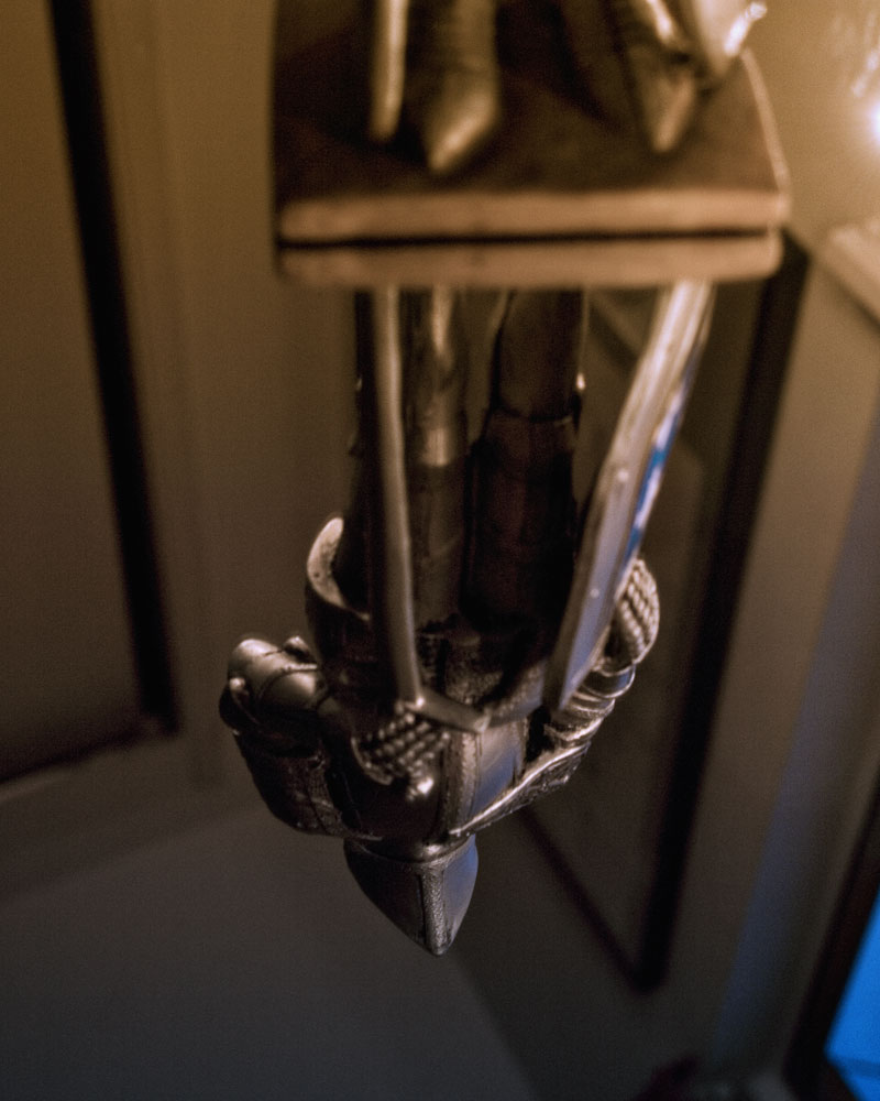 knight figure reflected upside down in mirror