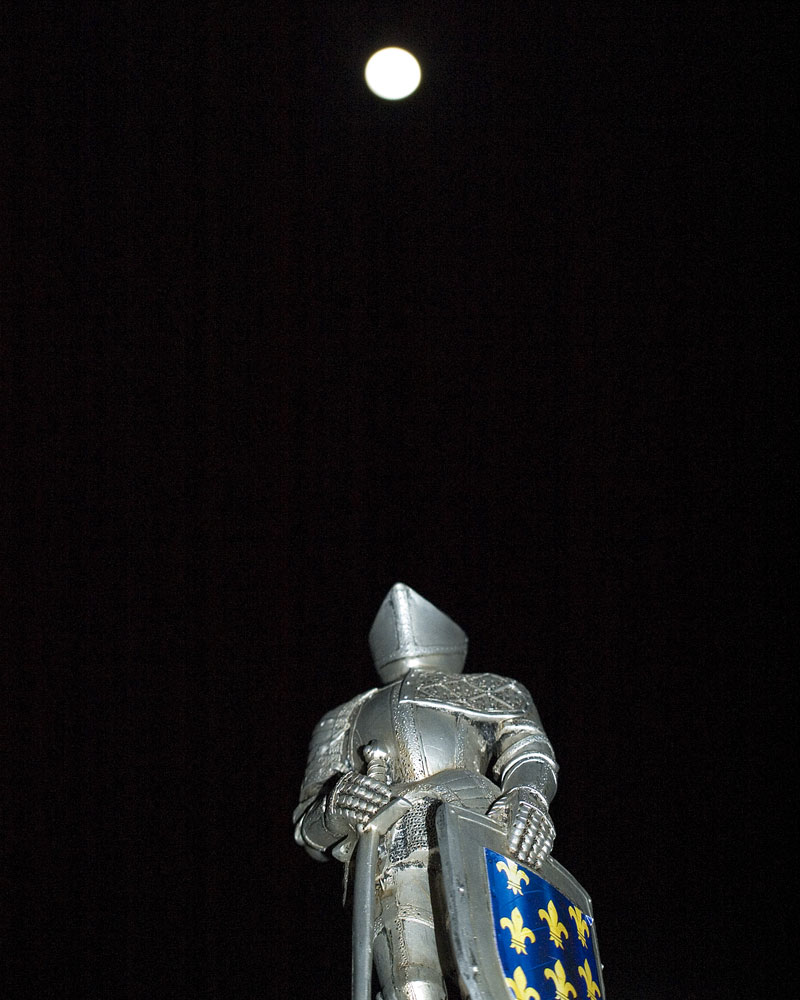 knight figuring looking up at moon