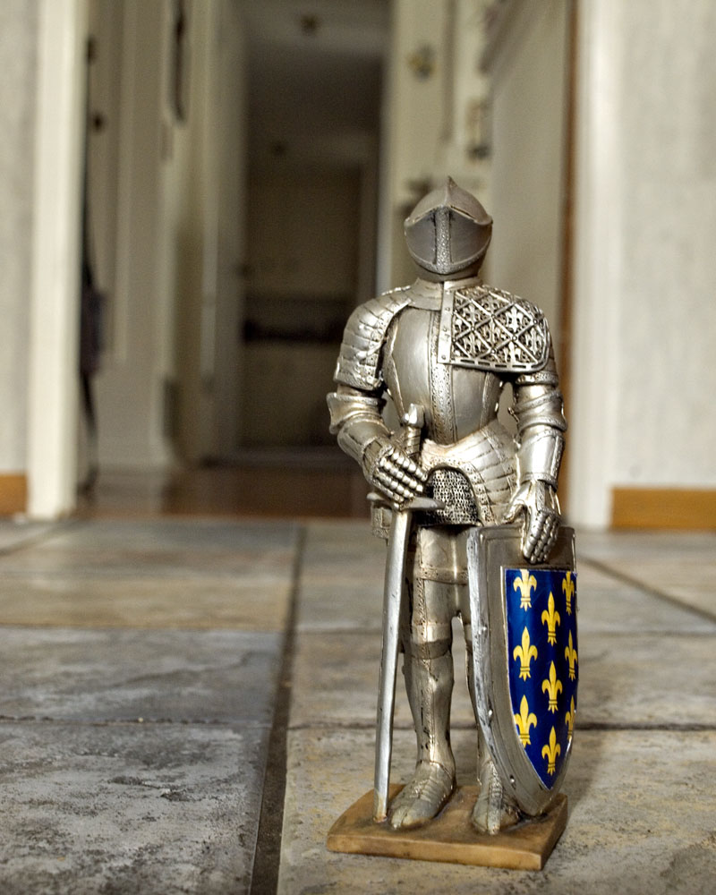 knight figure standing on floor in entryway