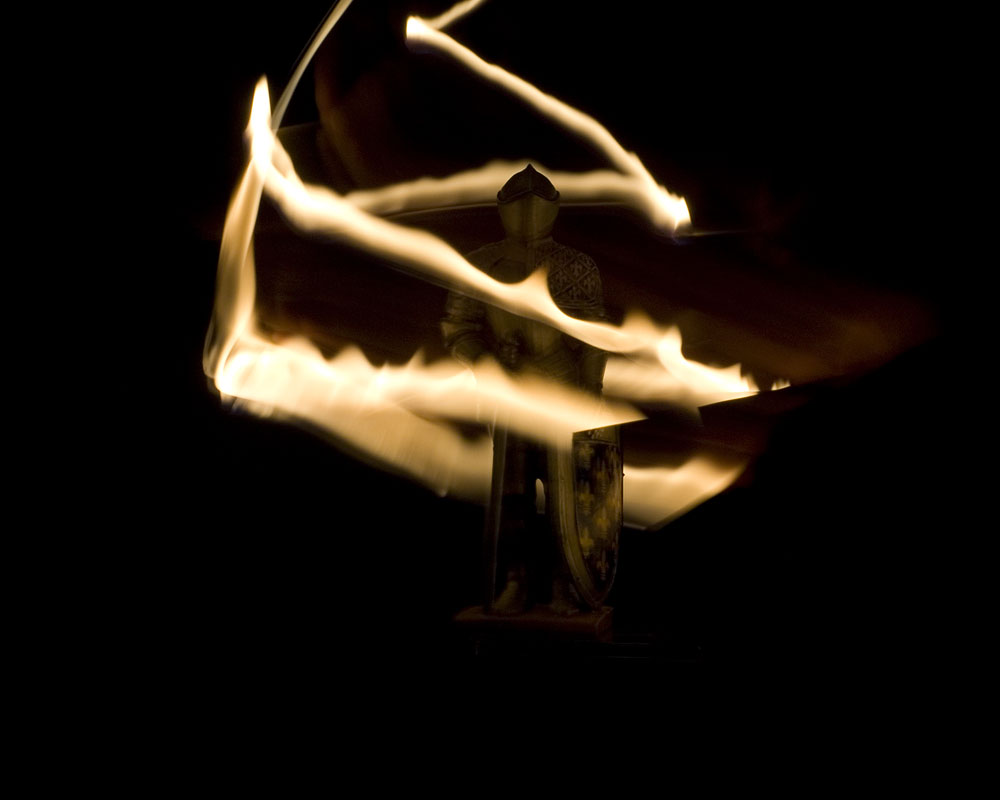 knight figure surrounded by light painting