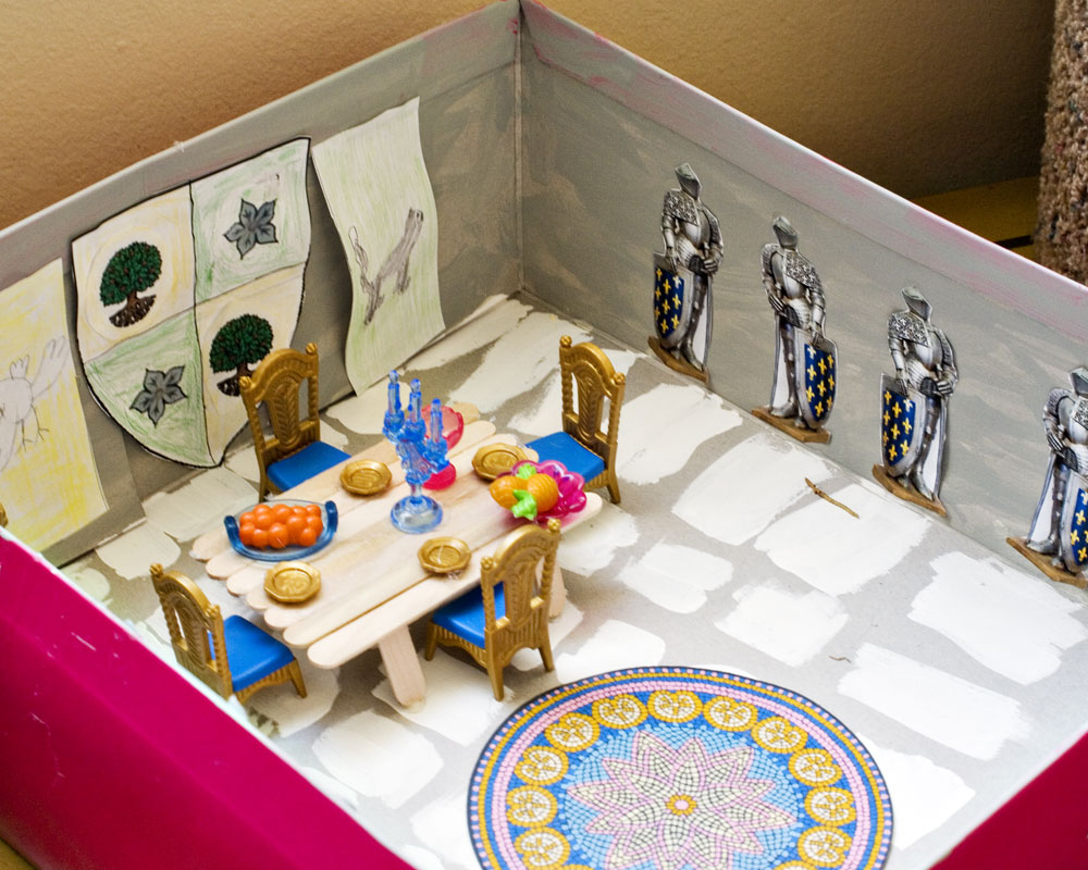 paperdoll knight figures in castle diorama