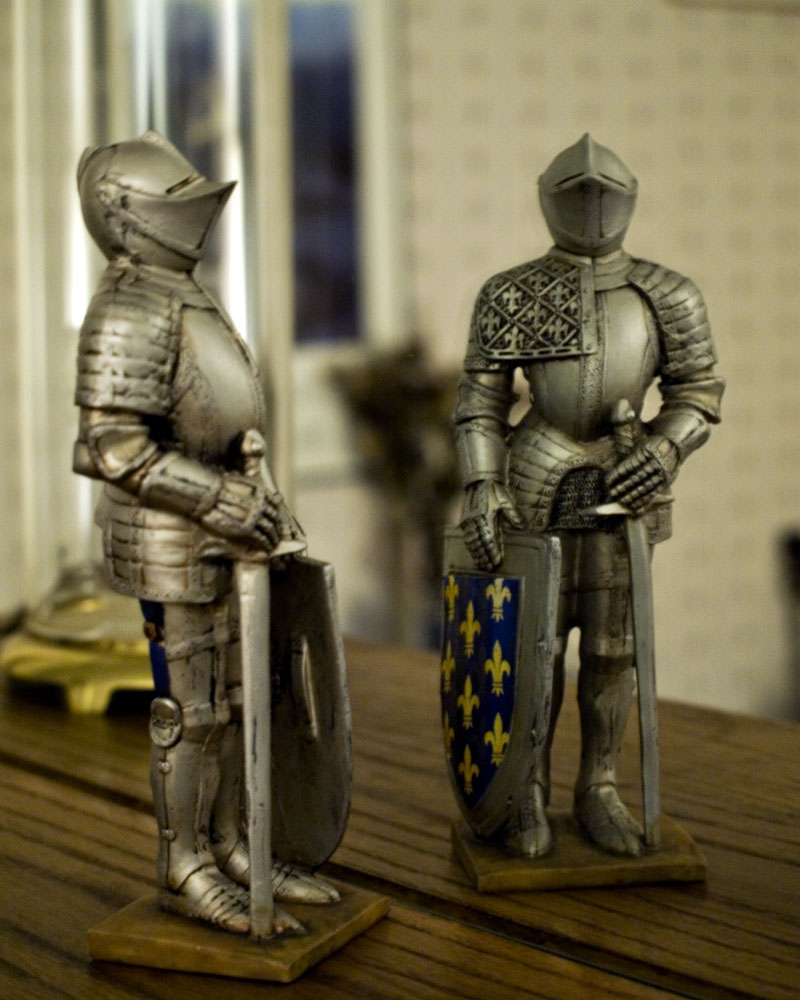 knight figure posing with his own reflection