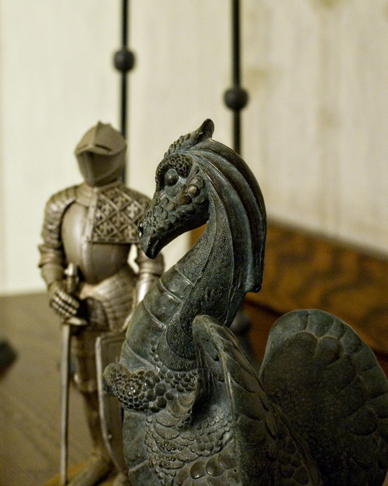 knight figure with small dragon figure