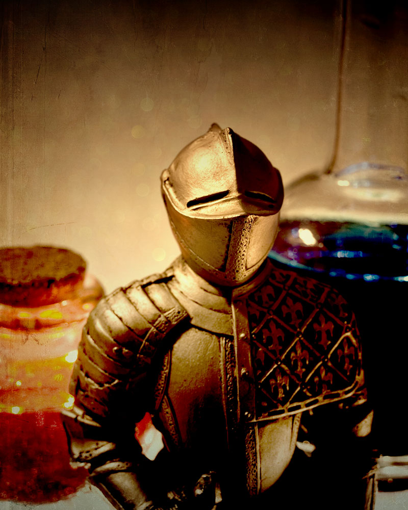 knight figure posing with potion bottles