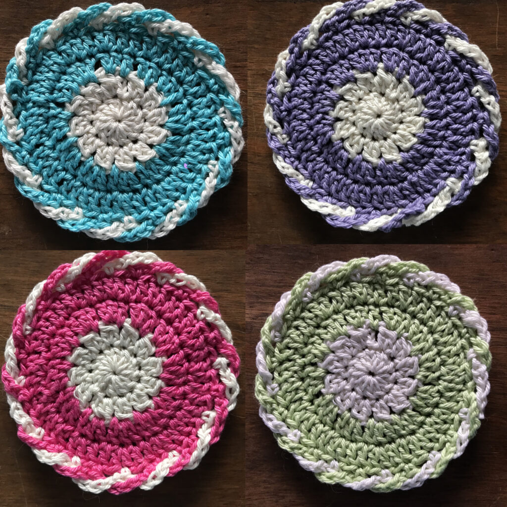 four coasters in teal, purple, pink and green