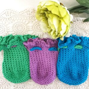 three ruffled dice bags